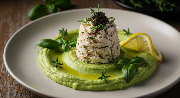 Bright green avocado purée topped with marinated crab and a sprinkle of caviar